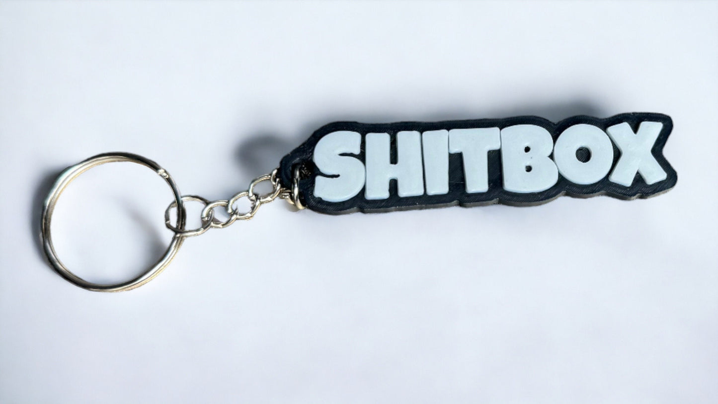 Shitbox Keychain for Car Keys, Hilarious Junk Car Accessory, Sarcastic Vehicle Keyring, Humorous Gift for Car Owners, Mechanics, Tinkerers